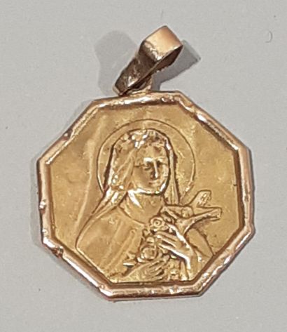 null Médaille de baptème de or jaune 18 K (750/oo) ornée de Sainte Thérèse de Lisieux

Poids...