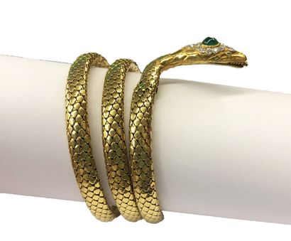 null Bracelet "Serpent" en or jaune 18 K (750/oo) à mailles tubogaz sur trois étages....