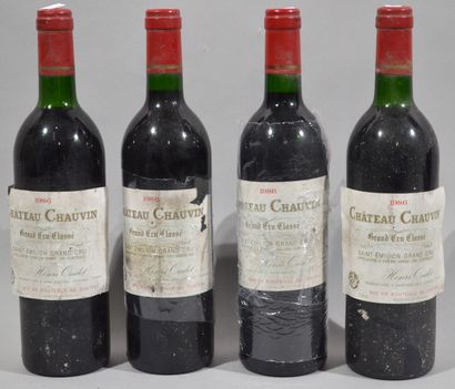 null 4 bouteilles de CHATEAU CHAUVIN 1986 (bas goulot étiquettes usées et décoll...