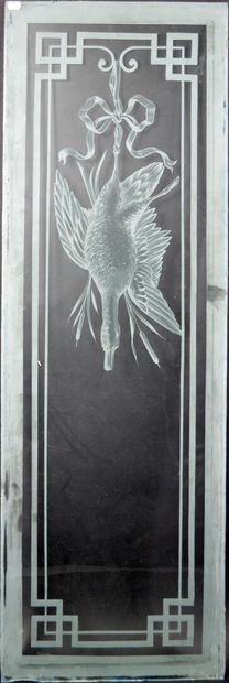 null VITRAIL en verre blanc à décor d'un trophée de chasse au canard.

(quelques...