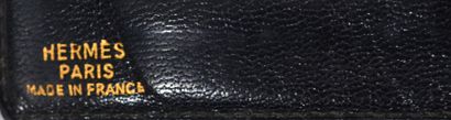 null HERMES Paris 
Portefeuille en croco noir à quatre feuilles.
14.5 x 9.5 cm
(légère...