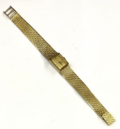 null HENO
Montre bracelet de dame en or jaune 18 K (750/1000e) à cadran rectangulaire...