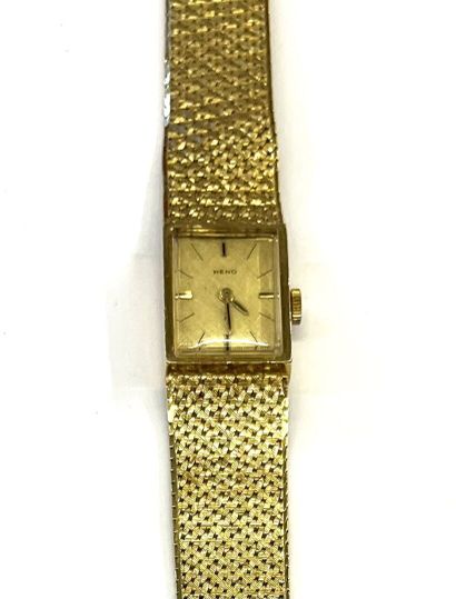 null HENO
Montre bracelet de dame en or jaune 18 K (750/1000e) à cadran rectangulaire...
