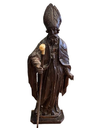 Saint-Évêque en chêne sculpté, dos creusé....