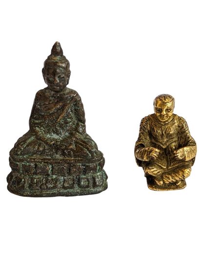 null Réunion de deux bouddha miniatures en bronze 
Hauteur max : 3.8 cm