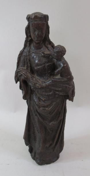 null Vierge à l'enfant en bois sculpté - Epoque XVIIe siècle - Ht : 36 cm (accidents...