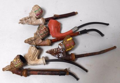 null Lot de quatre pipes de marque JACOB figurant des têtes de vieillards ottomans...