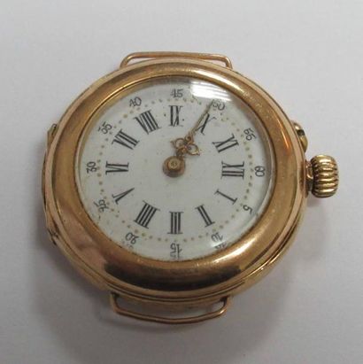 Boitier de montre bracelet de dame en or jaune 750/oo, le cadran rond à fond émaillé...