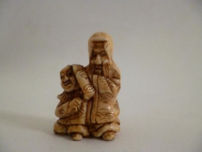 null Netsuke en ivoire bien sculpté d'un père et son fils discutant - Japon 19ème(fabriqué...