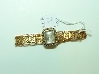 null Bracelet ancien en or jaune 18K (750/oo) à maillons rectangulaires articulés...