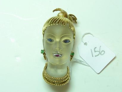 null Broche en or jaune 18K (750/oo) et cristal de roche figurant une africaine,...