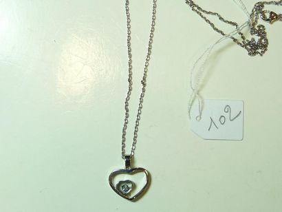 null CHOPARD : Pendentif "Double Coeur" en or gris 18K (750/oo) ajouré, agrémenté...