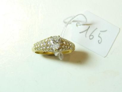 null CARTIER : Bague "Jonc" en or jaune pavée de diamants taille brillant et centrée...