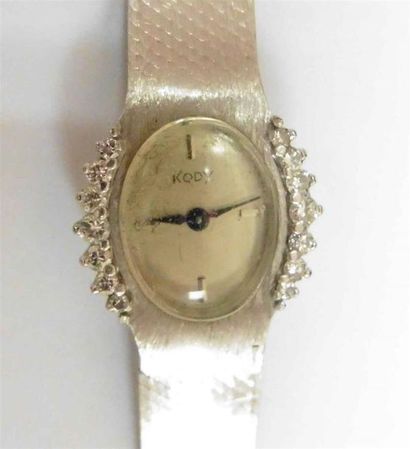 null KODY - Montre bracelet de dame en or gris 18 K (750/oo), le cadran de forme...