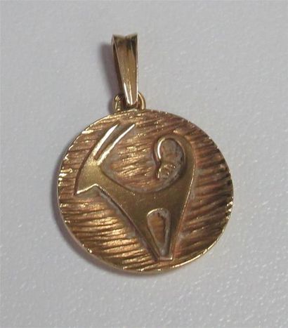 null Médaille astrologique en or jaune 18 K (750/oo) représentant le signe du capricorne...