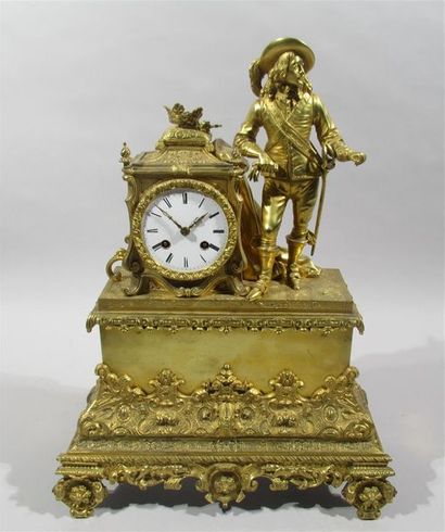 null PENDULE en bronze doré représentant le roi Louis XIII en habit de chasse, s'appuyant...