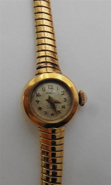 null Montre bracelet de dame en or jaune 18 K (750/oo), le cadran rond à fond champagne...