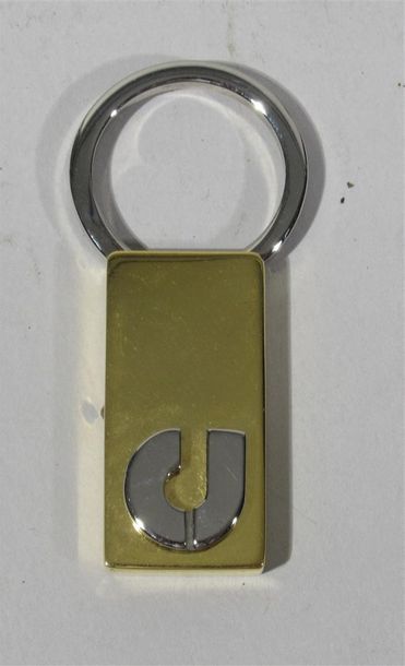 null Charles JOURDAN - Porte-clés en métal argenté et doré, la monture à décor en...