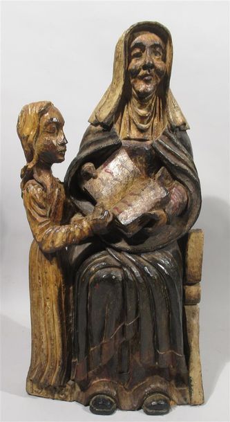 null "Sainte Anne donnant l'instruction à la Sainte Vierge" Sujet en bois peint polychrome...