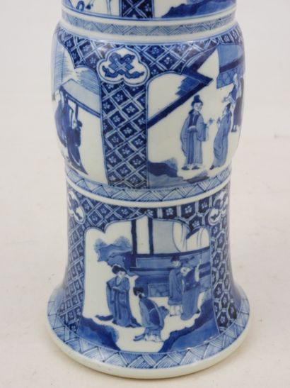 null CHINA - XIXth century: A white-blue porcelain "Gu" vase decorated with palace...