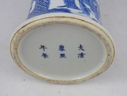 null CHINA - XIXth century: A white-blue porcelain "Gu" vase decorated with palace...