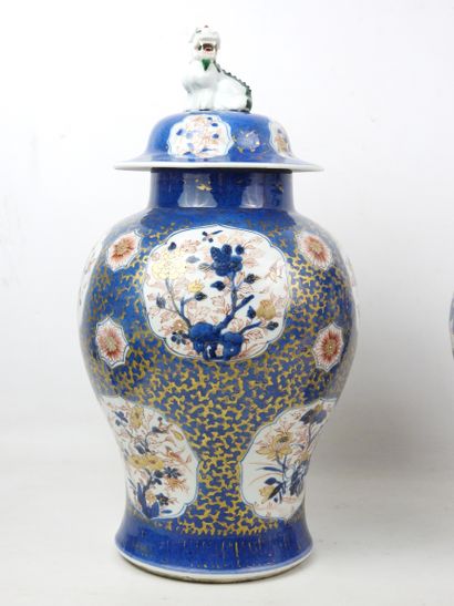 null 
CHINA: A pair of covered porcelain vases decorated in blue underglaze, iron...