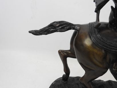 null Arab falconer on horseback. Modern proof in bronze with brown patina. After...