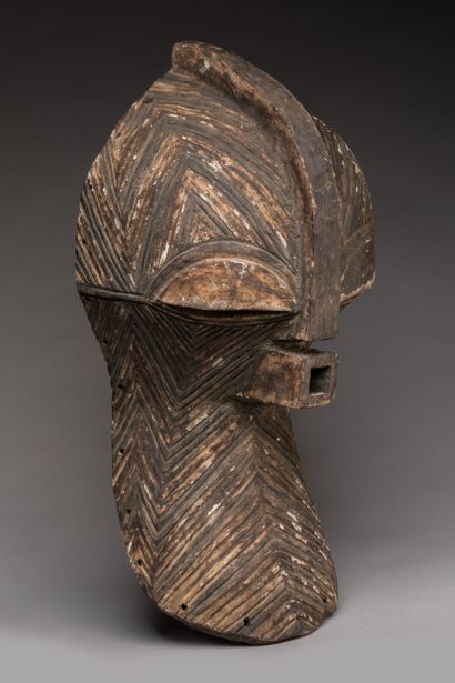 null Kifwebe" mask, SONGYE, Democratic Republic of Congo.

Wood, magic charge, raffia,...