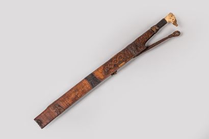 null DAYAK, Borneo, Indonesia.

Wood, iron, rattan splint, gum, metal.

Mandau" sword...