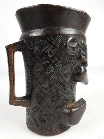 null Ceremonial palm wine cup, KUBA, Democratic Republic of Congo.

Wood, dark brown...