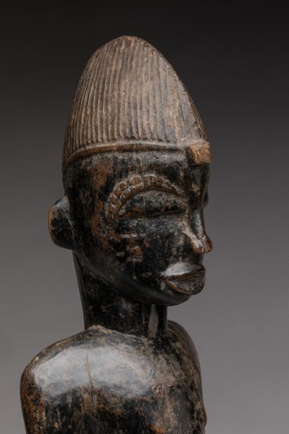 null SENOUFO, Ivory Coast.

Wood, brown-black patina.

Pombia-beaten statue evoking...