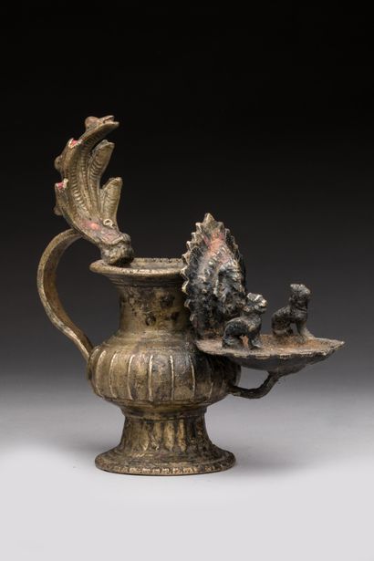 null NEPAL.

Bronze or copper.

Very old Sukunda cult lamp on foot with a nagaraja...