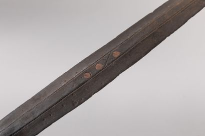 null YAKA, Democratic Republic of Congo.

Iron, leather, copper, wood.

Short sword...
