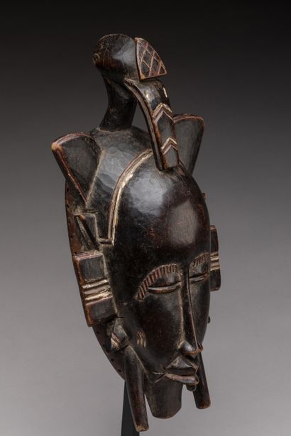 null SENOUFO, Ivory Coast.

Hard wood, dark brown patina, traces of pigments.

Kpelié"...