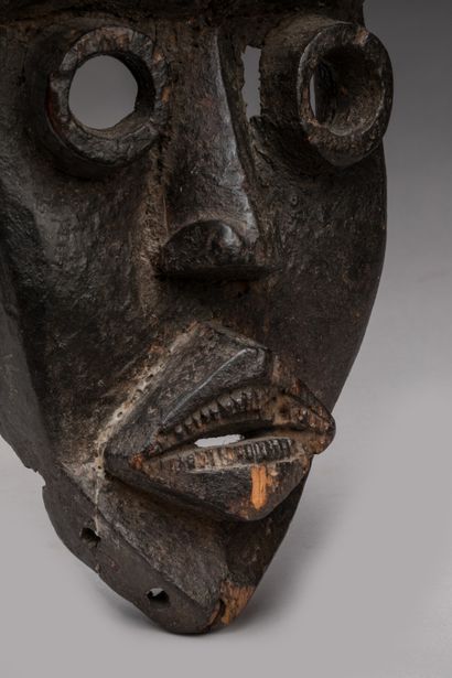 null DAN, Ivory Coast.

Wood, deep dark patina of use, slightly grainy.

Mask in...