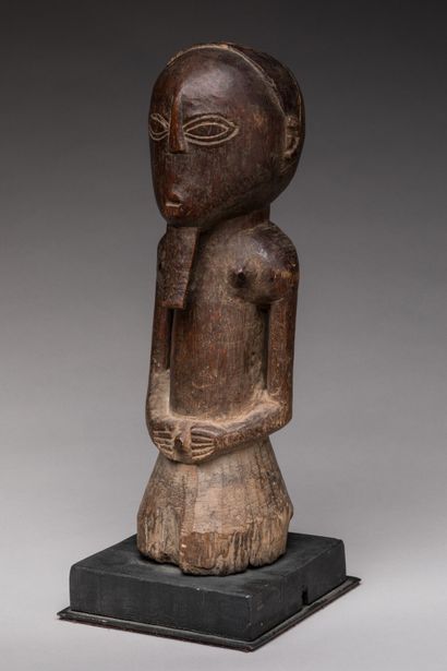 null KASONGO or KUSU, Democratic Republic of Congo.

Hard wood, brown-red patina.

Male...