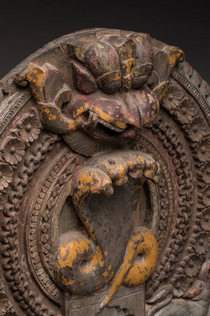 null INDIA.

Wood, old polychromy.

Temple altar with protective representation of...