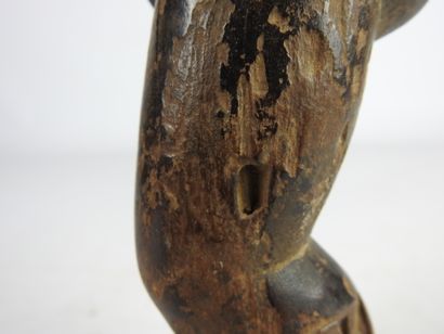null BAOULE, Ivory Coast.

Wood, dark brown patina.

Maternity statue representing...