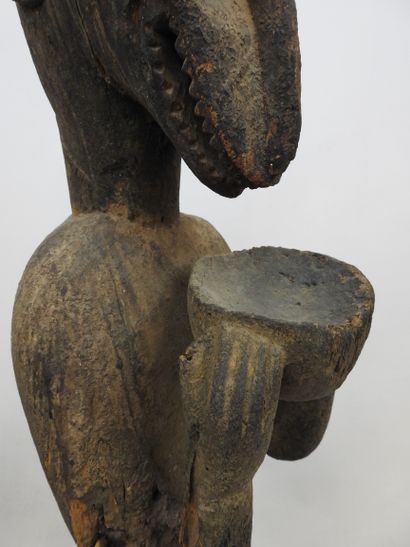 null BAOULE, Ivory Coast.

Wood, thick granular sacrificial patina, 

Large and ancient...