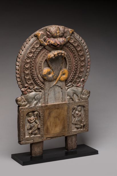 null INDIA.

Wood, old polychromy.

Temple altar with protective representation of...