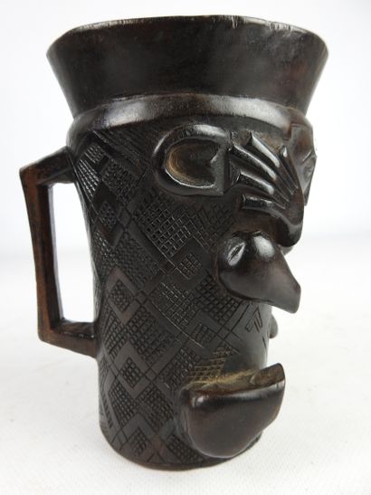 null Ceremonial palm wine cup, KUBA, Democratic Republic of Congo.

Wood, dark brown...