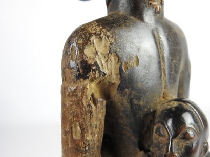 null BAOULE, Ivory Coast.

Wood, dark brown patina.

Maternity statue representing...