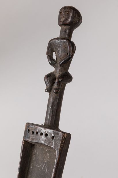 null KWERE, Tanzania.

Figurative wooden harp used during the ceremonies that mark...