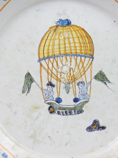 null NEVERS : Earthenware plate with contoured edges decorated with a hot air balloon...