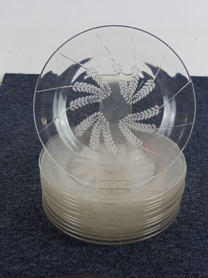 null LALIQUE: Part of a table service in transparent molded glass decorated with...