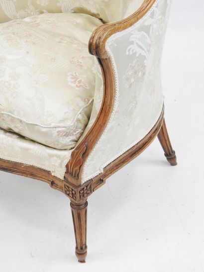 null A beechwood gondola shepherd's chair, molded and carved with flowers, fluted...