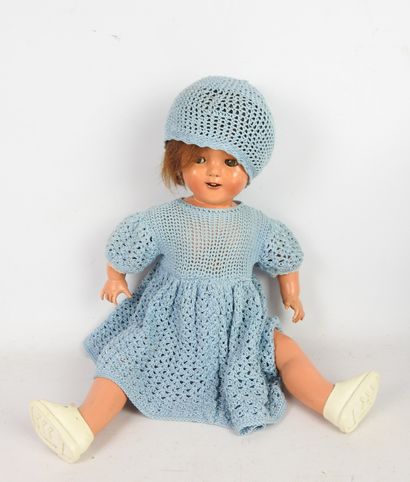 null RAYNAL: Plastic doll, sleeping eyes, open mouth, with mechanism. Woolen clothing....