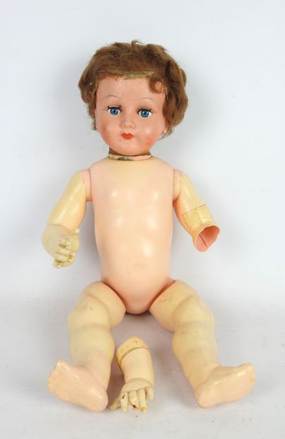 null RAYNAL: Plastic doll. Length: 50 cm. Accidents.