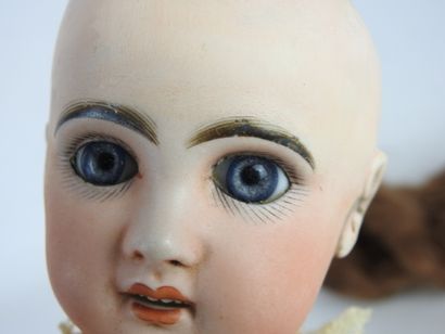 null POUPEE head in porcelain, fixed eyes, open mouth, pierced ears, articulated...