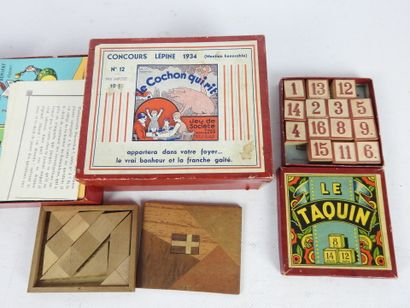 null LOT of four small board games including the Taquin, seven families, the laughing...